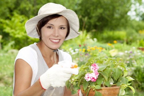 Technician inspecting and servicing gardening equipment
